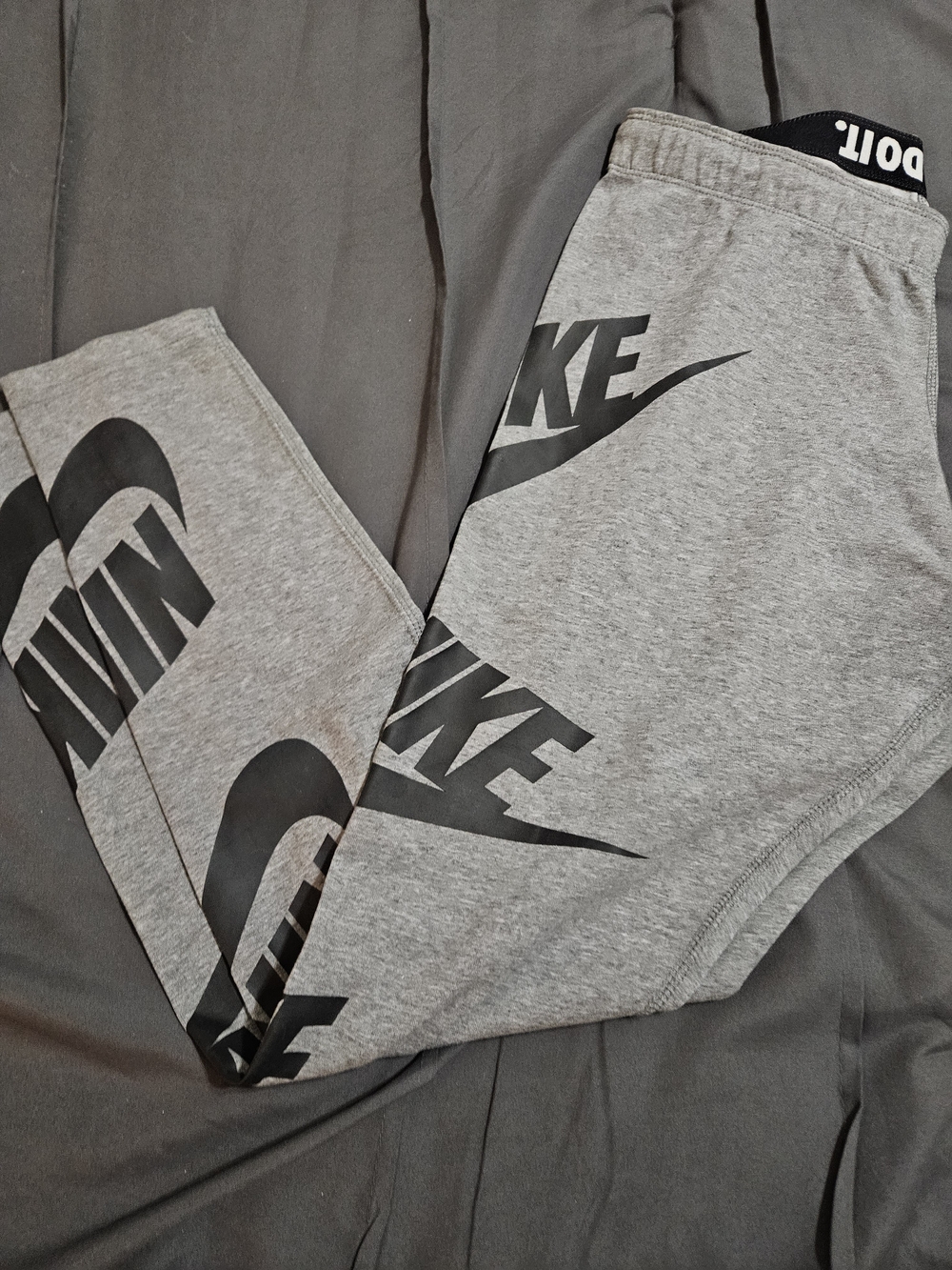 Nike Gray Sweatpants with Black Swoosh Logos